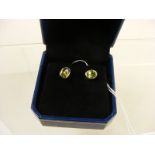 A 9k Oval Peridot stud earrings