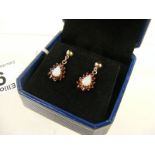 A pair of 9k Gold Opal and Garnet drop earrings