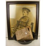 A Vintage tin helmet together with a framed picture of a soldier and gas mask in tatty box etc