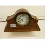 A vintage oak cased mantel clock