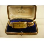 An 18ct gold Fortis Art deco style watch on expanding wristband (wristband not gold)