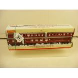 A boxed Hornby Coach Pack R4229 'The Pines Express' include BR MK1 Composite Coach and Two BR MK1