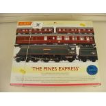 A boxed Hornby R2436 Train Pack 'The Pines Express' includes BR 4-6-2 'Combe Martin West Country