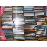 A carton of assorted CD's