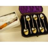 A cased set of silver apostle spoons together with box of glass handled knives