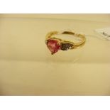 A Diamond Pink Sapphire gold ring