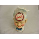 A Cast Coca-Cola money bank approx height 7.