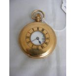 A 9ct gold half hunter pocket watch in working order