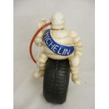A cast Michelin man on tyre - approx height 9.