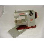 Vintage children's battery powered Vulcan sewing machine