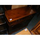 A Yew wood reproduction side cabinet with two drawers fitted over cupboard base