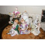 A 19th Century Berlin? Hot Chocolate Pot and cover together with a selection of Porcelain figures