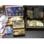 A collection of coins and banknotes,