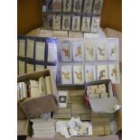 A carton of loose cigarette cards to include WD & HO Wills, Players, Gallaghers, Carreras,