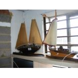 Two retro table lamps both in the form of sailing vessels