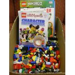 Box of Lego together with 3 Lego books