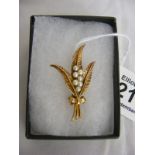 A 9ct gold and seed pearl brooch