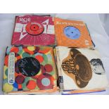 A collection of 1960's 45rpm records to include Kinks, Elvis Presley, Cliff Richard, Pat Boone,