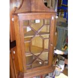 A Vintage Oak corner hanging cupboard