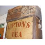 A vintage packing crate together with three wooden storage boxes