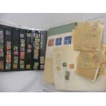 A large quantity of loose world stamps, some in approval booklets,