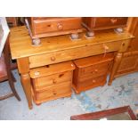 A Pine dressing table with fitted long single drawer