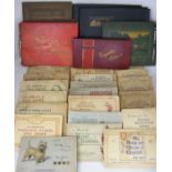 Ten albums and 25 books of cigarette cards.