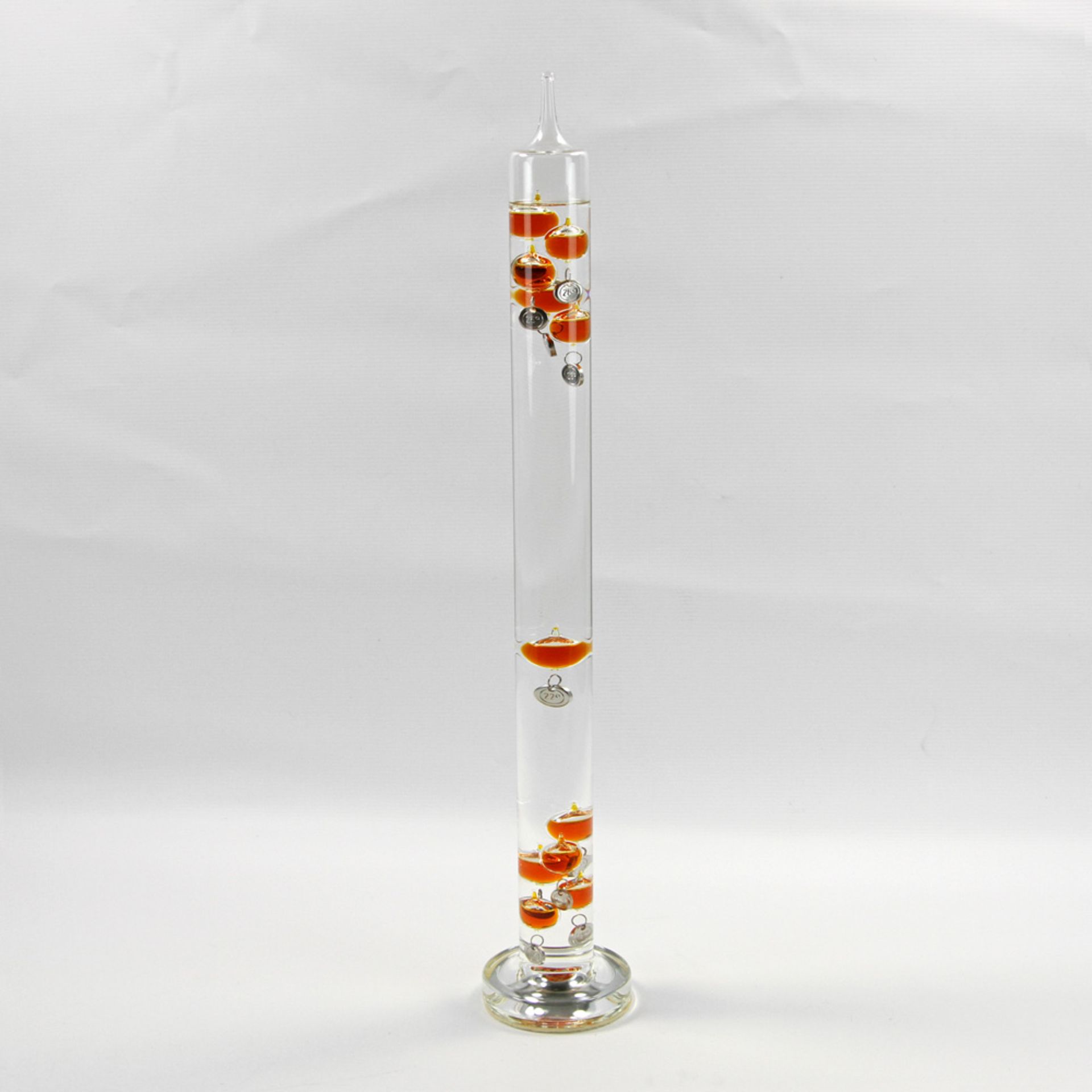 FLÜSSIGKEITS-THERMOMETER Firma "TERMOMETRO LENTO", Glaszylinder mit verspiegelter Sockel, H: 62