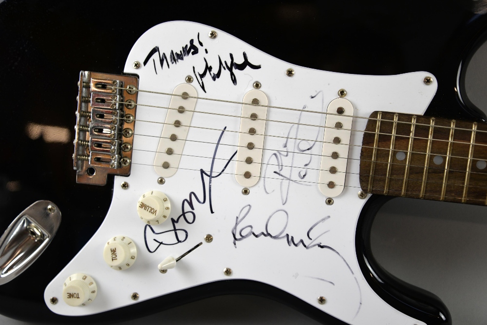 Fender Squier Strat guitar signed on the scratch plate by Paul McCartney, Pete Townshend, Bob Geldof - Image 2 of 4