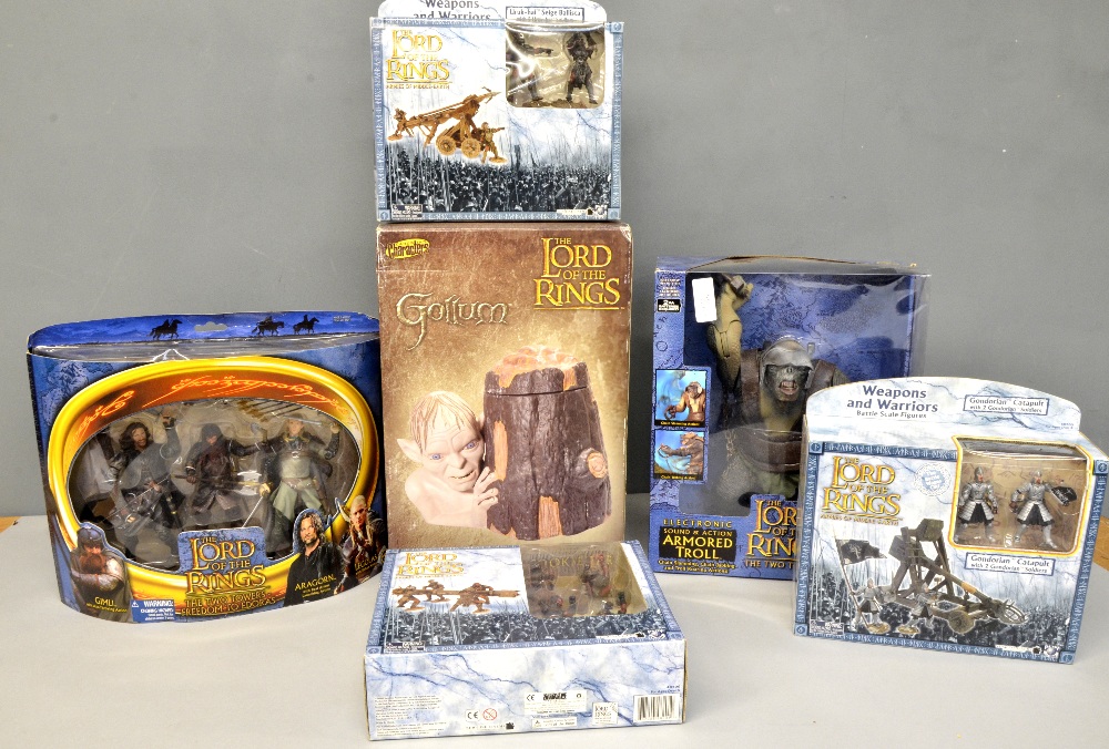 Lord of the Rings limited edition cookie jar, an armoured troll, a triple figure set, and three