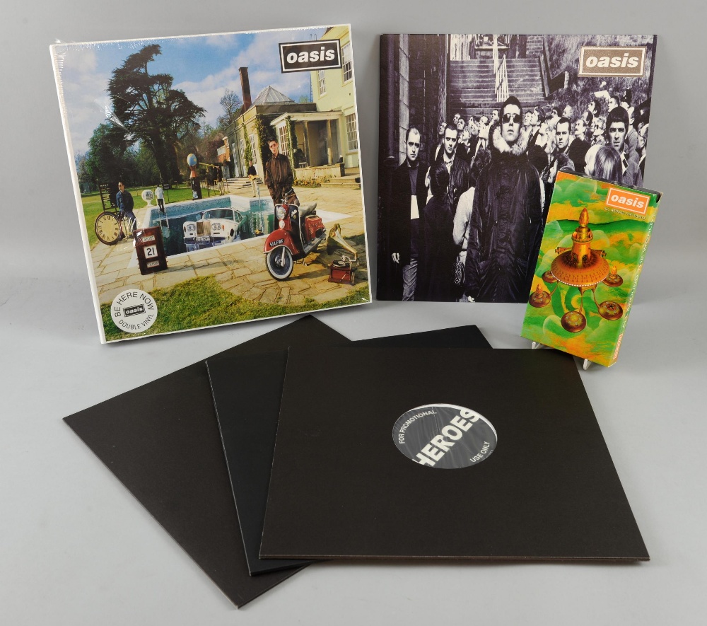 Oasis Be Here Now 12” box set presentation book with CD, 12” Promos of D’You Know What I Mean, b/w