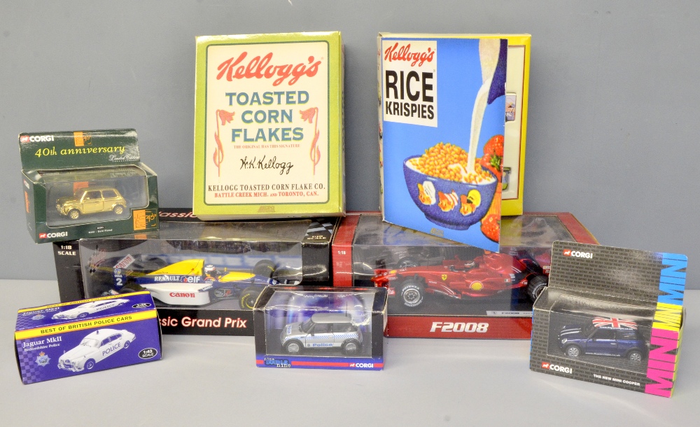 McLaren M16 racing car, a Jaguar coupe, 2 Hotwheels racing cars and a quantity of other cars, all