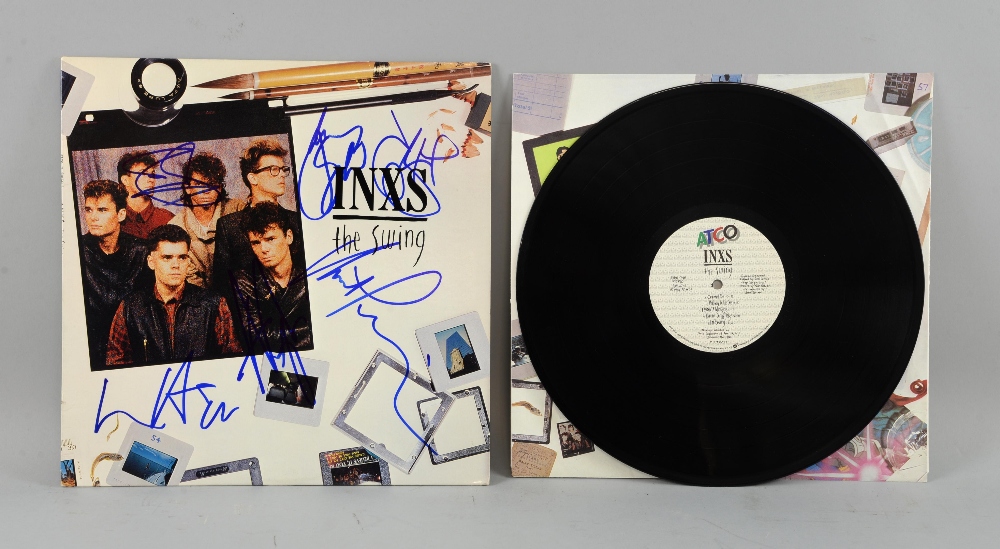 INXS, The Swing, Vinyl LP signed to front cover by all six in blue.Provenance: From a single owner