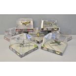 Nineteen Corgi World War II Legends assorted model aeroplanes in perspex boxes, and 4 Atlas Editions