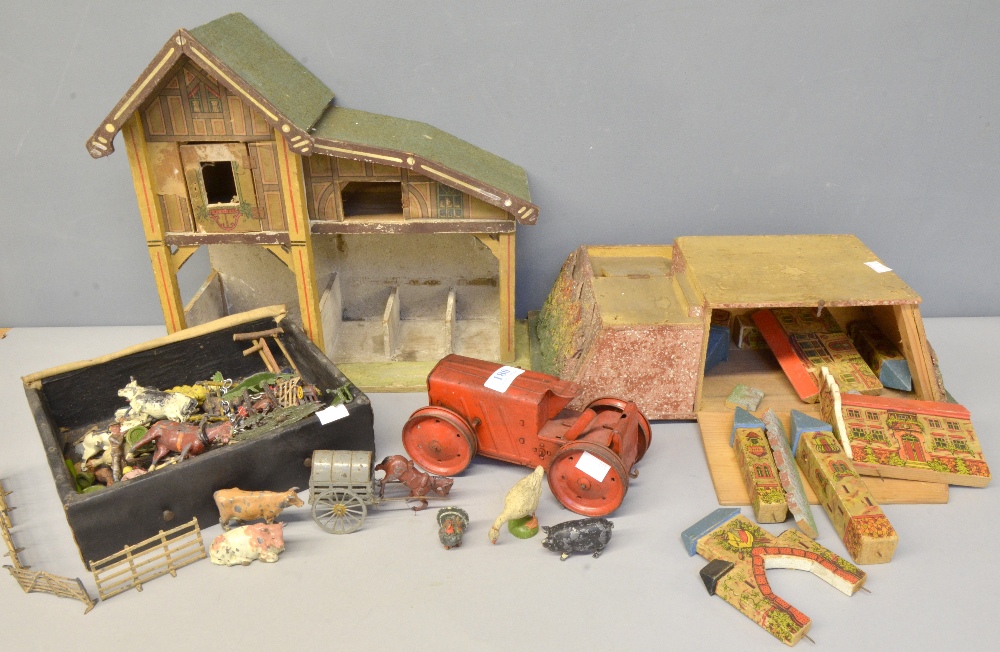 Tri-ang 1920's clockwork tractor, a collection of Britains and other makers lead farmyard animals