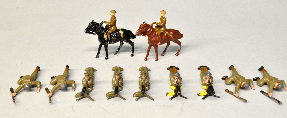 Britains, two mounted officers, four with machine guns and four crawling figures,