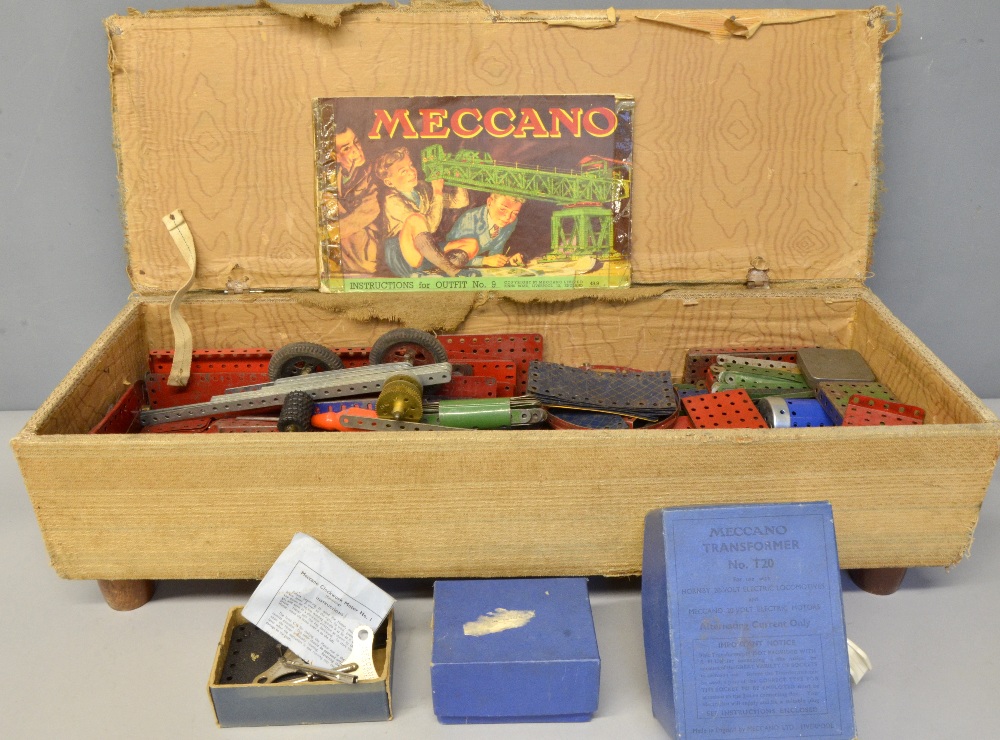 A large quantity of Meccano, mostly green and red painted, motors and instruction manuals