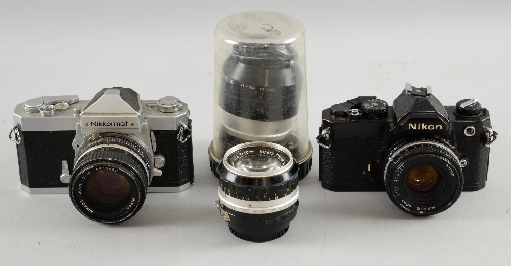 Nikon 35mm camera with 50mm 1.8 lens, Nikkormat 35mm camera with 50mm 1.4 lens, Nikkor 135mm 3.5