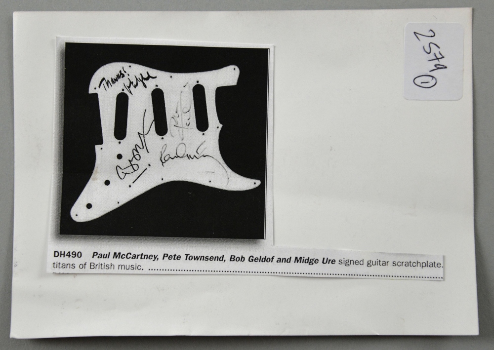Fender Squier Strat guitar signed on the scratch plate by Paul McCartney, Pete Townshend, Bob Geldof - Image 4 of 4