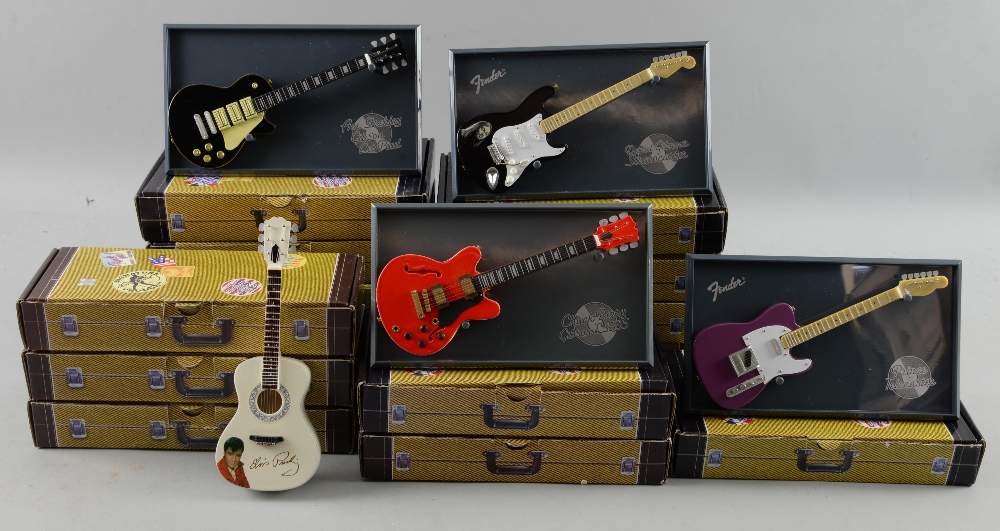 14 boxed Guitars of The Stars, including David Gilmour, George Harrison, Slash, Jimmy Page & others