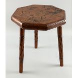 James Shoolbread & Co Aesthetic Movement table, oak, of octagonal form with carved decoration of a