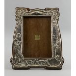 Art Nouveau  silver photograph frame, by Charles S Green & Co Ltd with embossed decoration of the