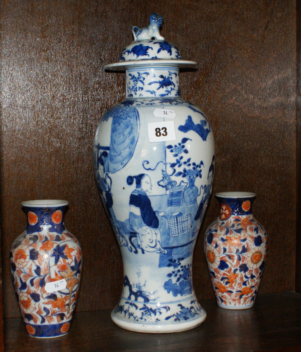 Two Meiji period Japanese porcelain vases, a larger blue and white vase, a tea bowl and saucer,