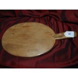 Oak cheeseboard by Mousey Thompson of Kilburn.