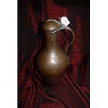 Antique copper hand made jug possibly Turkish or Mongolian. 48cm high.