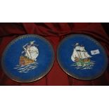 A pr of wedgwood gilded galleon plates numbered x9903 (23.5cm diameter).