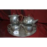 Handmade Arts & Crafts English pewter 4 piece tea service on a tray.