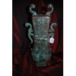 Antique Chinese Bronze vase shaped ornament highly decorated with handles in the form of dragons