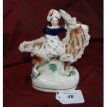 19thC Staffs figure girl on a reindeer.