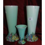 Clarice Cliff green conical vase with floral base together with 2 others which have chipped rims.